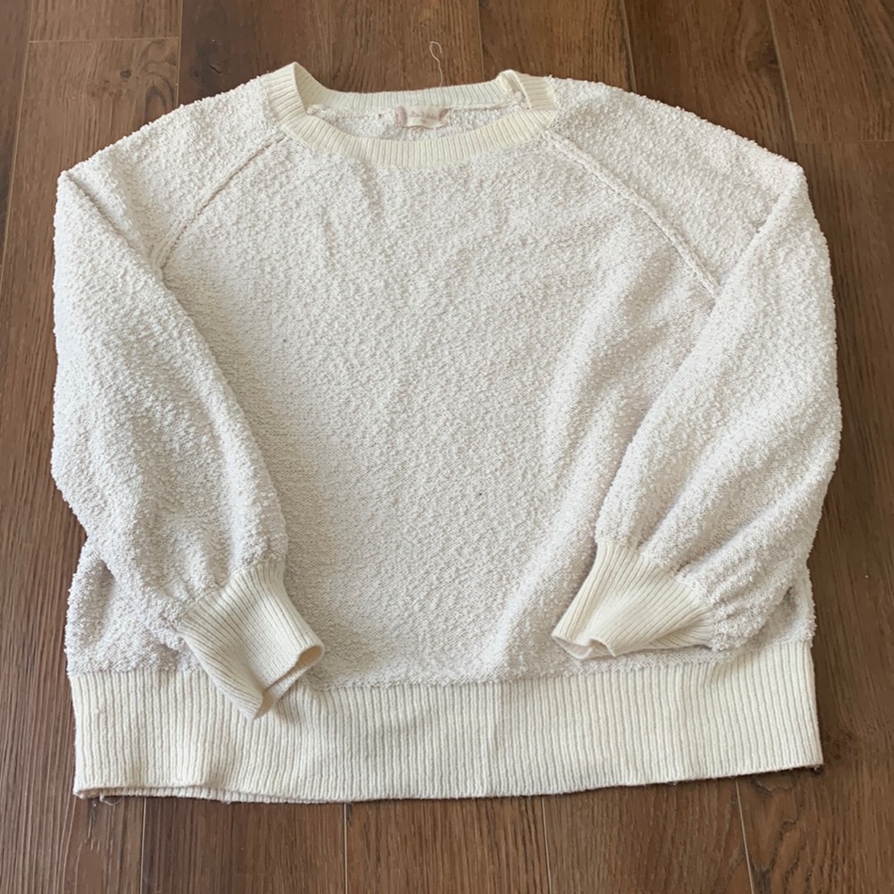 Cream sweater.